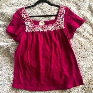 Women’s burgundy blouse